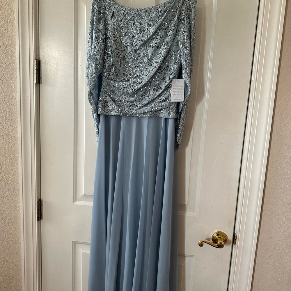 Beautiful brand new dress very light blue